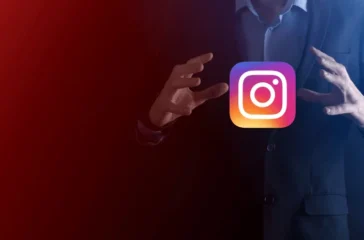 Digital marketing expert performing a strategic gesture around a floating Instagram logo, symbolizing social media marketing techniques.