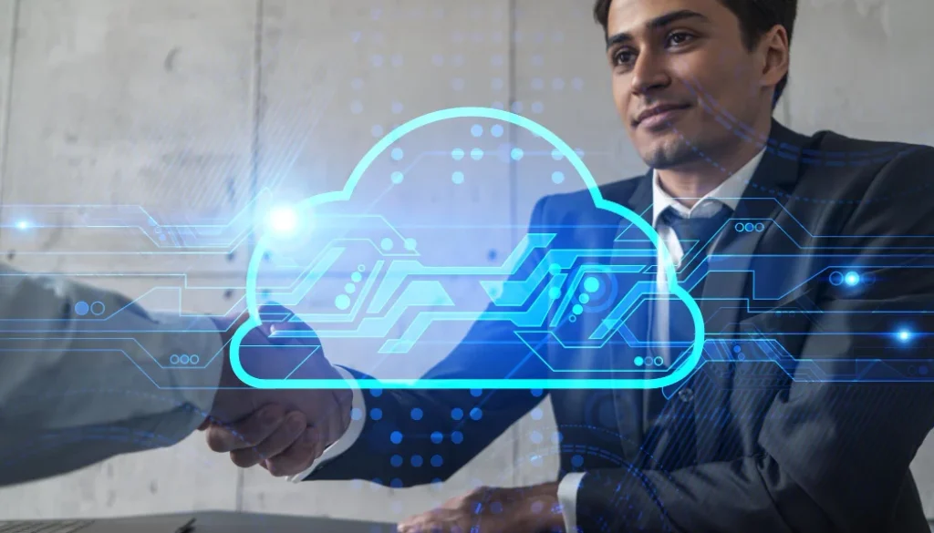 Businessman shaking hands with a colleague, symbolizing a successful deal in cloud security engineering, with a digital cloud icon overlay.