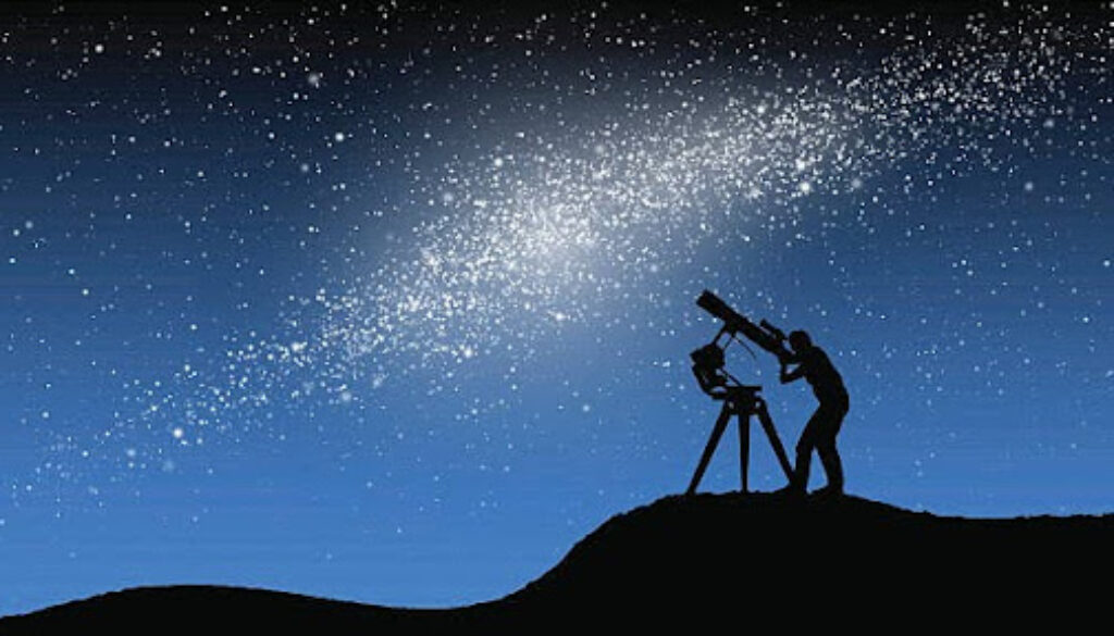 Person stargazing through a telescope under a starry night sky.