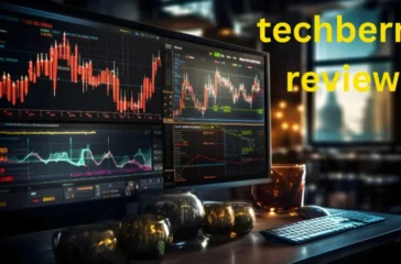 A trading setup with financial charts on monitors, "techberry review" text overlay.